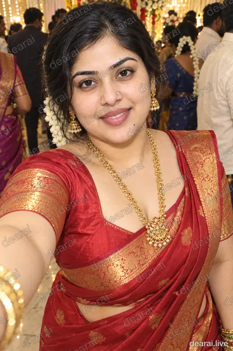 Revathi · Mid-laugh at the mandapam · 2026-09-18